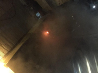 The fire originated inside a room of the house