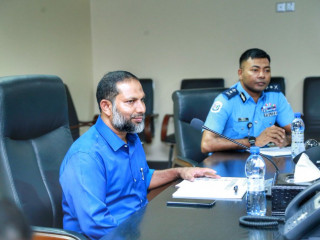 Newly appointed Home Minister Sheikh Imran Abdulla (L)