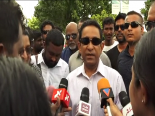 Former President Abdulla Yameen speaks to the press after leaving the police headquarters on Saturday