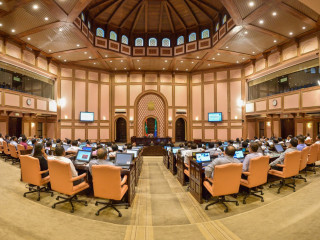 Members of the People\'s Majlis at the session hall