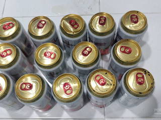 The men were arrested with a total of 14 cans of beer