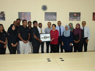 Water Solutions presents a poster of the documentary to Minister of Arts, Culture and Heritage Yumna Maumoon