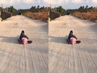 ޗެލެންޗު ފުރިހަމަ ކުރުމަށް މަގެއްގެ މެދުގައި ޒުވާން އަންހެން ކުއްޖެއް އޮށޯވެލައިގެން