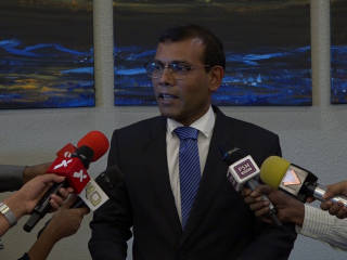 Nasheed speaks to the press before leaving to India