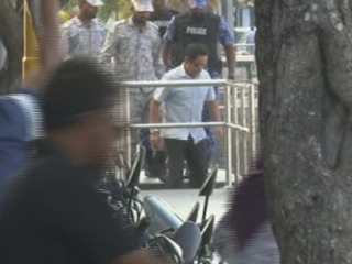 Yameen being taken to prison