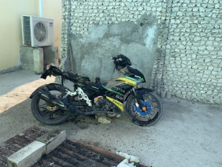 The motorcycle had been damaged beyond the fire
