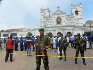 Sri Lankan authorities cordon-off a bombed area