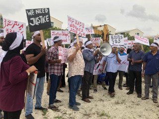 Protesters called for justice and the arrest of those responsible for the \'scam\'