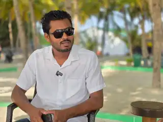 Ali Fawaz, the President-elect of the Ha. Ihavandhoo Island Council, speaks during RaajjeTV’s "Fashaairu" program. | RaajjeMV