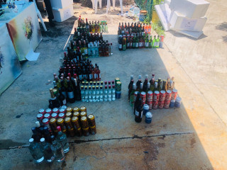 Police destroy copious amount of confiscated alcohol