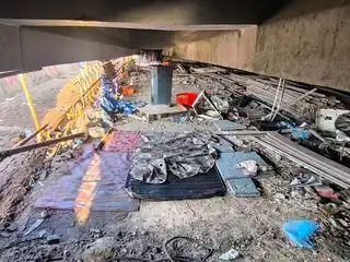 Foreigners are currently living under the Sinamale' Bridge. Bedding and other personal belongings used for sleeping have been set up in the area. | Dhuvas MV