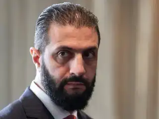 ސީރިއާގެ ރައީސް އަޙުމަދު އަލް ޝަރާ