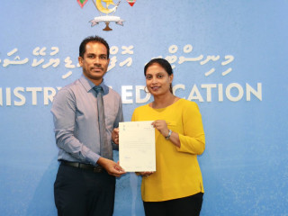 Ahmed Ali with Education Minister Aishath Ali