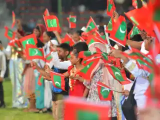 މިނިވަން ދުވަސް ފާހަގަ ކުރުމުގެ ޙަރަކާތެއްގެ ތެރެއިން ކުޑަ ކުދިން ތަކެއް ޤައުމީ ދިދަ ހިފައިގެން.