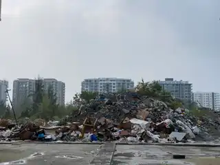 ގެދޮރުވެރިޔާ ޓަވަރުތައް ކައިރީގައި ޖަމާކުރާ ކުނިފުނިތައް ނެގުމަކީ އެފްޑީސީން ކުރަން ޖެހޭ މަސައްކަތެއް ނޫން، ނަމަވެސް ކޮންމެ ދެހަފްތާއިން އެއް ހަފްތާއިން މިދަނީ ކުނި ނަގަމުން: ހަމްދާން 