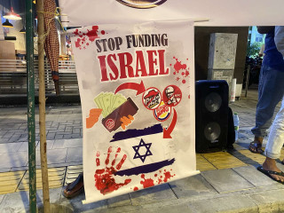 Protestors called for the boycott of companies profiting from the genocide of Palestinians
