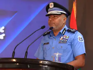 Commissioner of Police Ahmed Mohamed at the ceremony held to grant promotions to police officers.