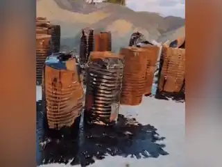 Tar barrels brought for the F. Magoodhoo Airport project have ruptured, causing the contents to leak onto the ground. | RaajjeMV