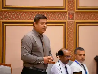 Minister Ameen speaking during a sitting of the People's Majlis held on 30 June 2026.