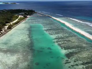 Haalu Kihineh? Dh. Maaenboodhoo: Large section of reclaimed land for boundary wall construction lost to erosion.