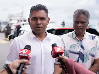Former Vice President Faisal Naseem and Male' City Mayor Adam Azim.
