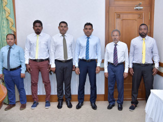 The Vice President with members of the Kandoodhoo Council