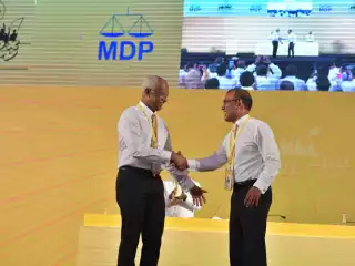 The then party president Mohamed Nasheed (R) and former president Ibrahim Mohamed Solih (L) greeting each other at the last congress held by MDP in 2022