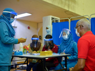 President Ibrahim Mohamed Solih receiving his second Covishield vaccine dose