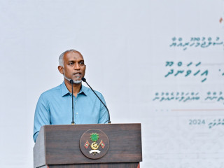 The president speaking to residents of HA. Ihavandhoo