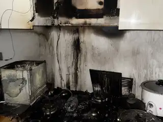 A kitchen has sustained extensive damage following a dangerous fire on the seventh floor of the One Avenue apartment complex in Hulhumale'. | NDMA