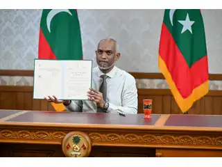 President signs first amendment to Foreign Exchange Act into law.