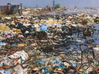Ecological Problem from Fuming Waste Dump on the Coastline of Maafushi Island, Maldives