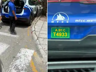 A photo circulating on social media showing an MTCC taxi allegedly picking up passengers from the street in violation of established regulations.