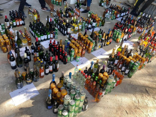 Destroyed were bottles of alcohol in custody of Dharavandhoo police station