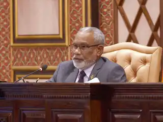 Speaker of the People's Majlis, Abdul Raheem Abdulla, presides over a sitting of the Parliament.