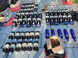Alcohol bottles found during a police operation