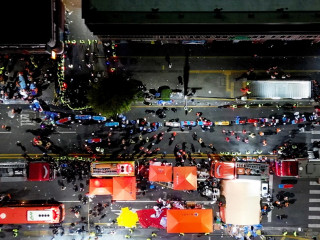 Rescue workers work at the scene where a stampede during Halloween festivities killed and injured many people at the popular Itaewon district in Seoul, South Korea
