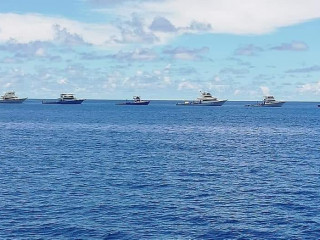 Fishing boats in a queue (file photo). | X