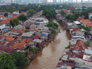 Mudslides damaged more than 2,000 houses in several villages across Indonesia