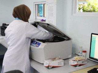 Lab technicians conducting Covid-19 tests at IGMH laboratory