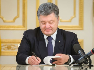 ޔޫކްރެއިންގެ ކުރީގެ ރައީސް ޕެޓްރޯ އޮލެކްޝިއޮވިޗް ޕްރޮޝެންކޯ