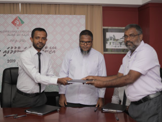 ހައްޖު ކޯޕަރޭޝަނުން އެޖެންޓުންނާއި އެކު ސޮއި ކުރުން