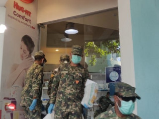 MNDF officers working alongside STO to deliver pending orders from the people