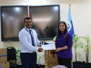 MPL\'s CEO, Shahid Ali presenting the systems to Education Minister, Dr. Aishath Ali
