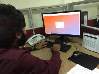 އޭޖީ އޮފީހުގެ މުވައްޒަފަކު ޓާސްކް މެނޭޖަރ ސޮފްޓްވެއަރ ބޭނުން ކުރަނީ