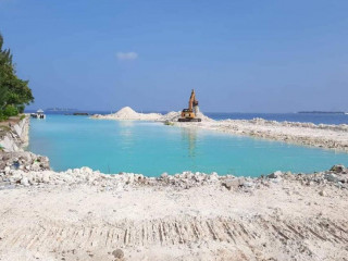The Dhoonidhoo harbor re-development and reclamation project is ongoing smoothly