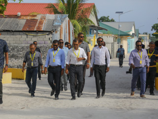(File photo); Main ruling Maldivian Democratic Party\'s leader and former President Mohamed Nasheed (C) during a campaign trip