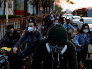 ޗައިނާގެ ވުހާން ސިޓީ- މީހުން ބޭރަށް ނިކުމެ އުޅެނީ މާސްކު އަޅައިގެން