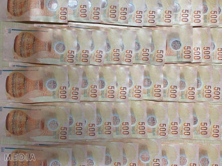 Cash discovered by authorities in an earlier operation