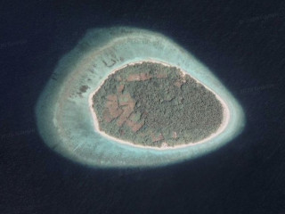 ހޮޅުމީދޫ މަތިން ނަގާފައިވާ ފޮޓޯއެއް: އެ ރަށަކީ 28 ހެކްޓަރުގެ ބިމެއް އޮންނަ ފަޅު ރަށެއް